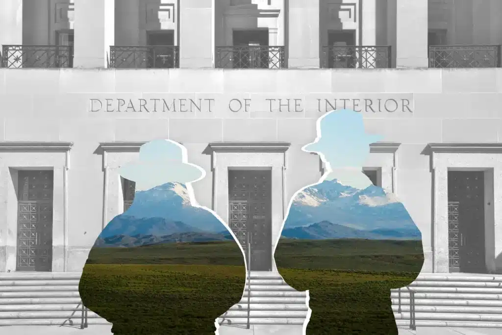 photo illustration / composition of a silhouette of 2 rangers in front of the Department of the Interior building